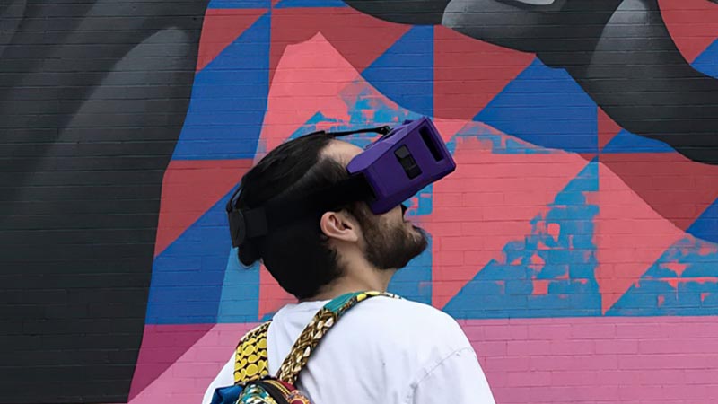 student with VR goggles